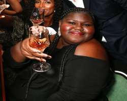 Gabourey Sidibe consuming alcohol